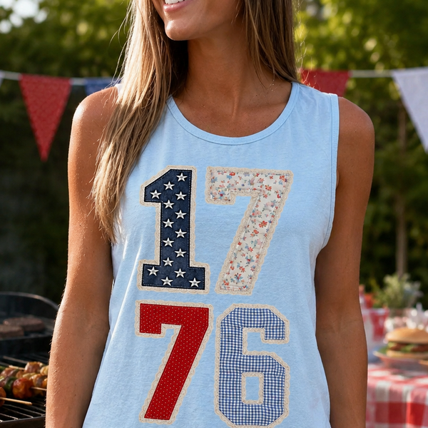 Woman wearing the 1776 lace pattern chambray patriotic graphic tank at a summer cookout