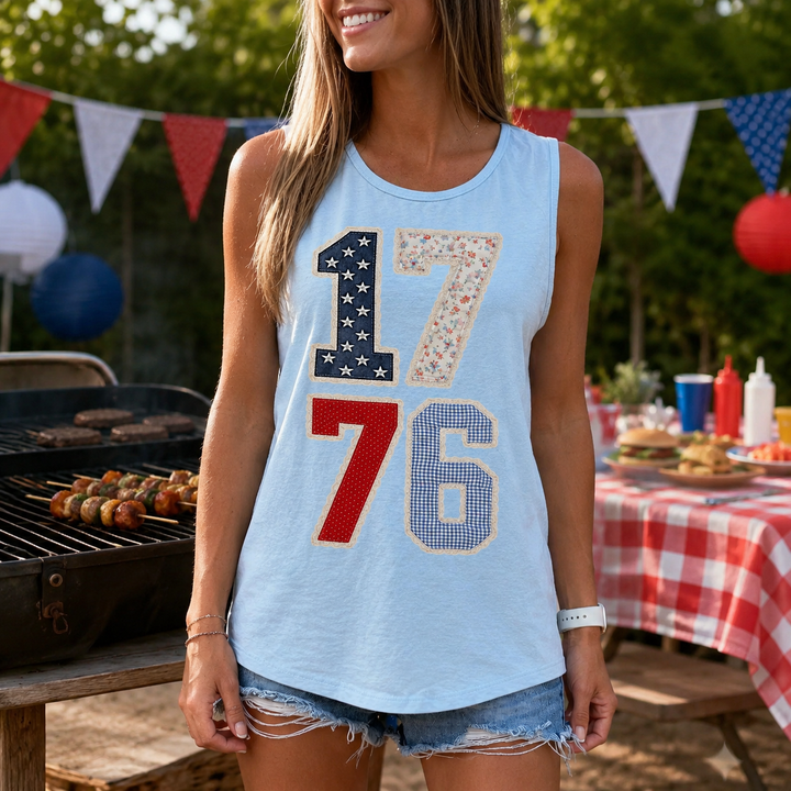 Woman wearing the 1776 lace pattern chambray patriotic graphic tank at a summer cookout