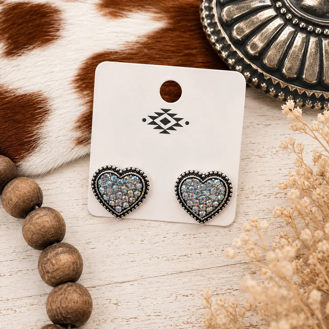 Silver-tone heart stud earrings filled with iridescent rhinestones