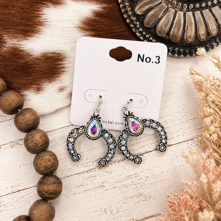 Silver-tone squash blossom dangle earrings with iridescent rhinestones