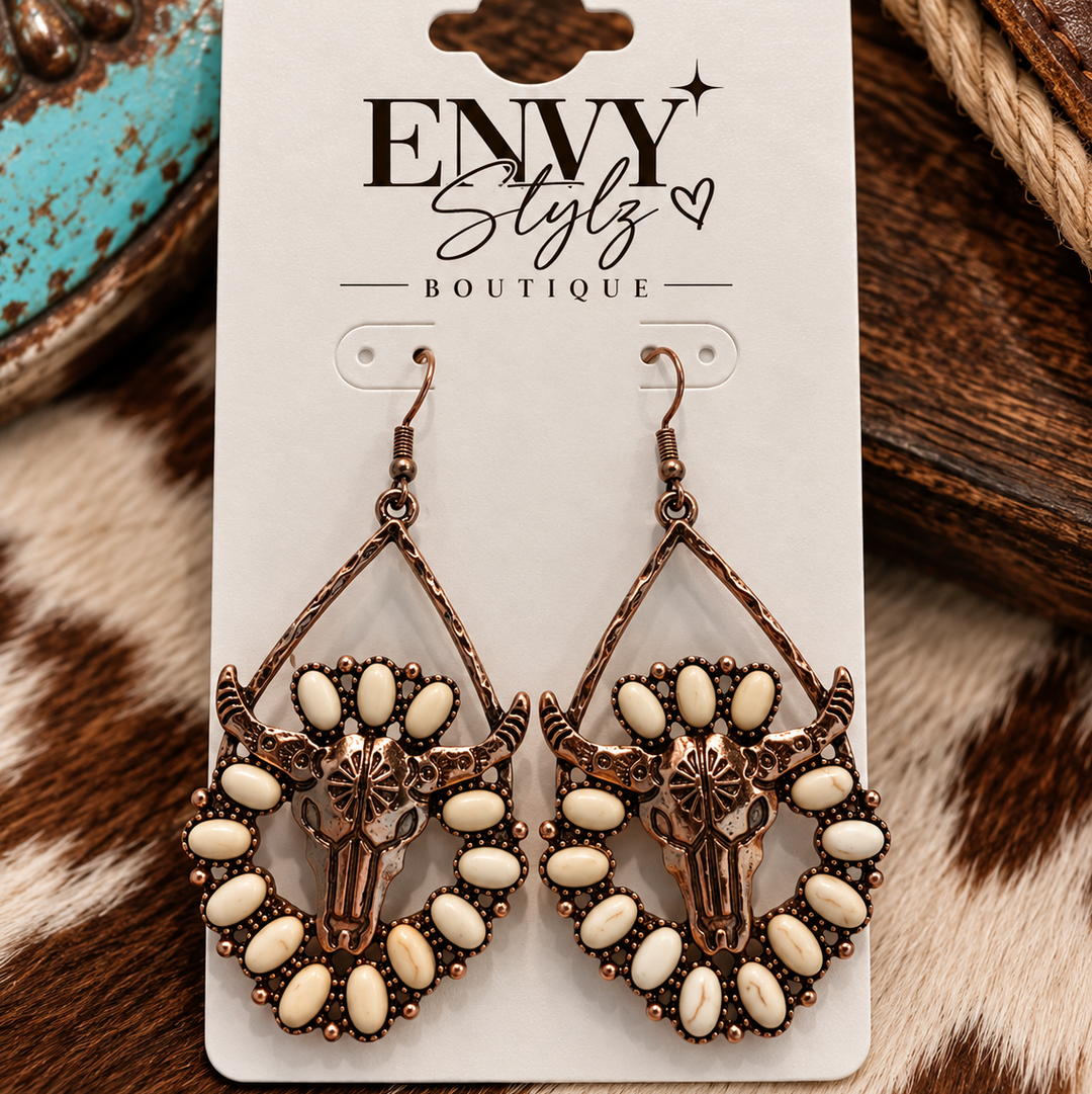 Desert Longhorn Earrings with copper-tone longhorn skulls and ivory stone accents