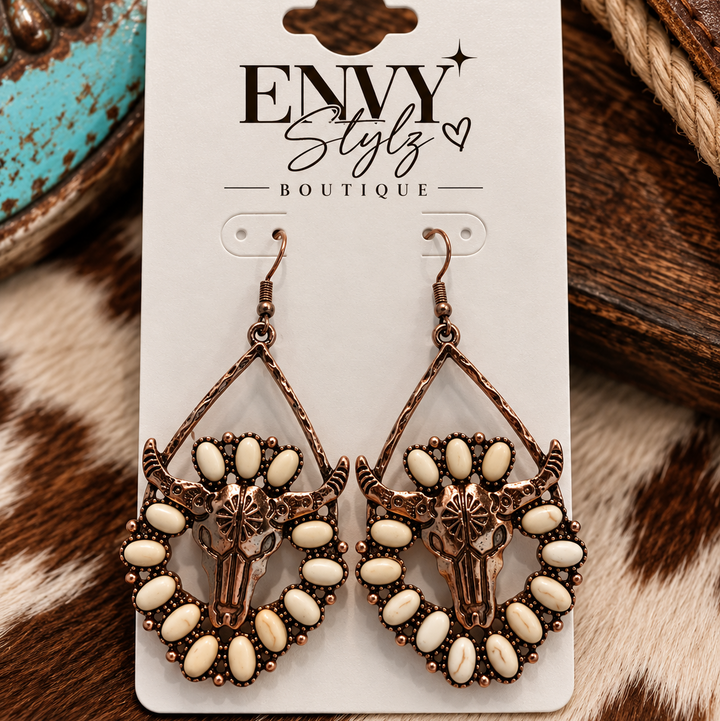 Desert Longhorn Earrings with copper-tone longhorn skulls and ivory stone accents