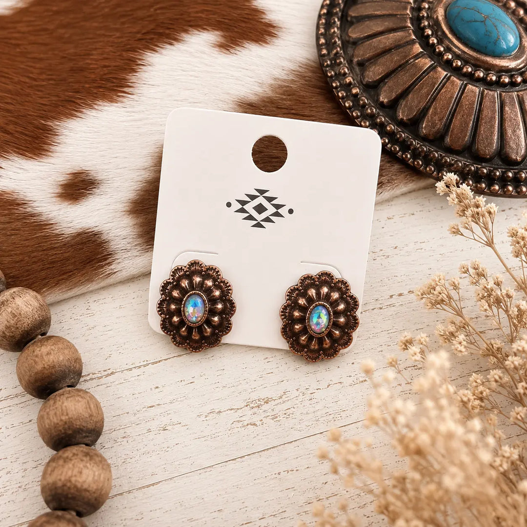 Copper-tone concho stud earrings with colorful iridescent rhinestone centers