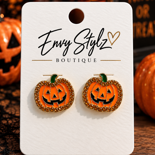 Pumpkin Sparkle stud earrings with orange jack-o-lantern faces and rhinestone trim