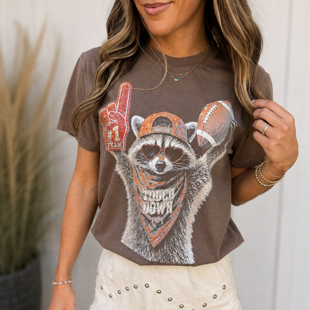 Touchdown Raccoon Graphic T-shirt Envy Stylz Boutique
