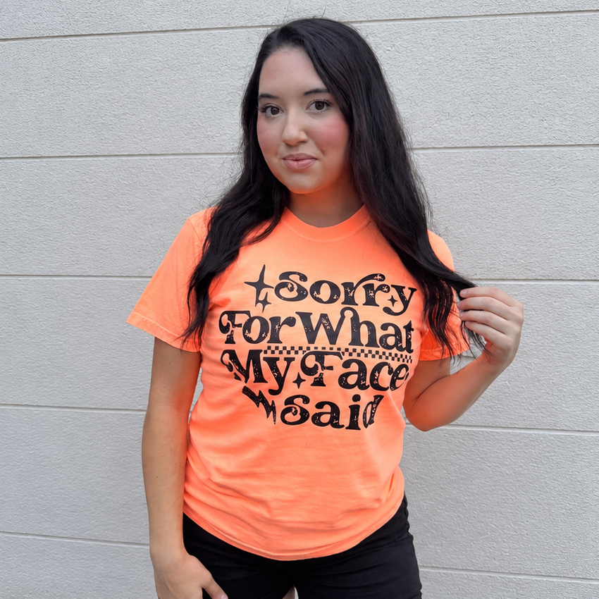 Neon orange Sorry for What My Face Said graphic tee from Envy Stylz Boutique