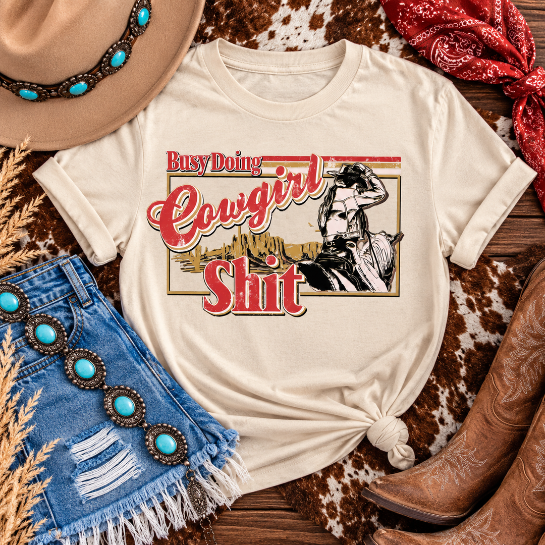 Busy Doin’ Cowgirl Sh*t Graphic Tee