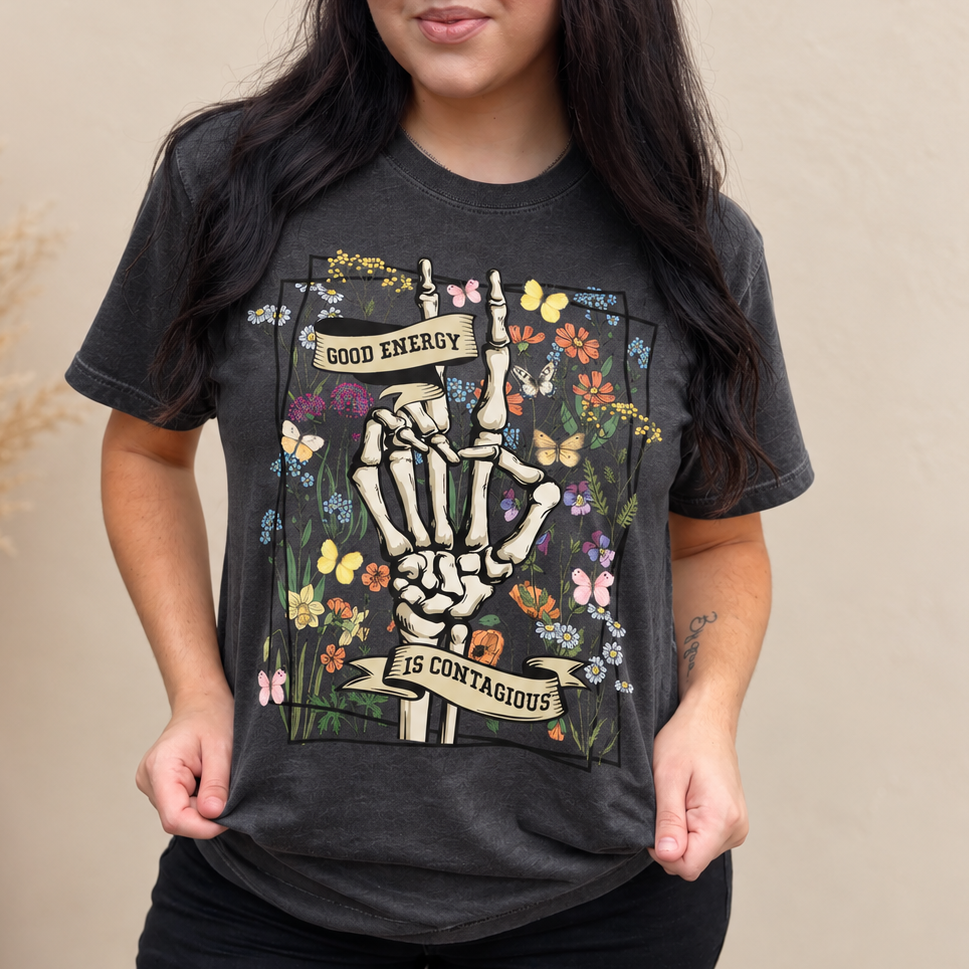 Woman wearing the Good Energy Charcoal Positive Vibes graphic tee