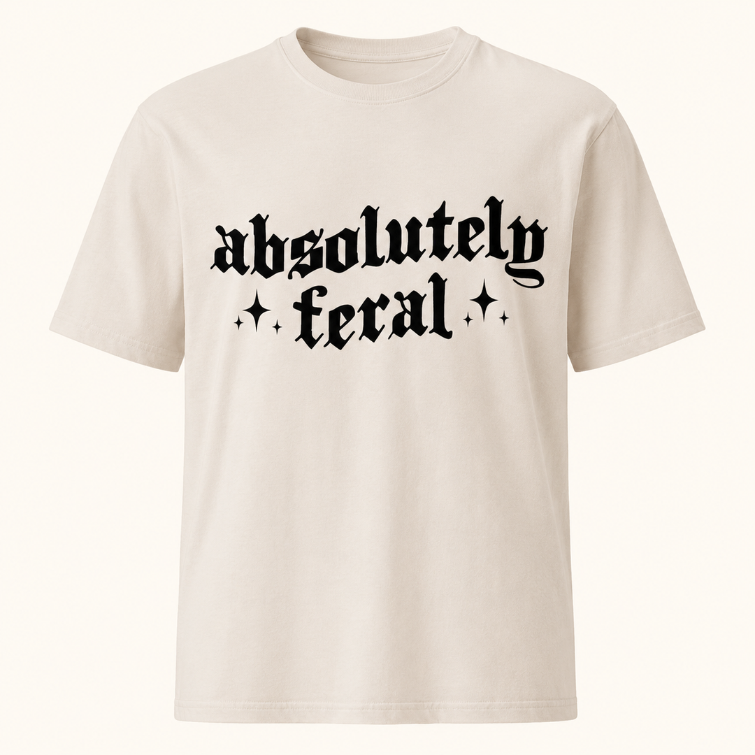 Absolutely Feral sand funny graphic tee with black gothic lettering, front product view