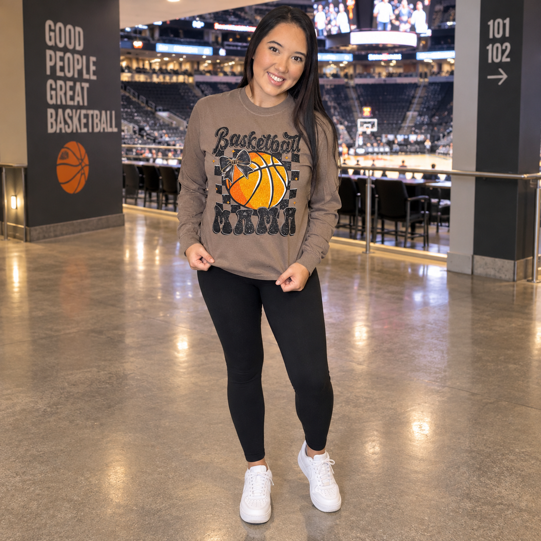 Basketball Mama espresso long-sleeve graphic tee styled at basketball arena