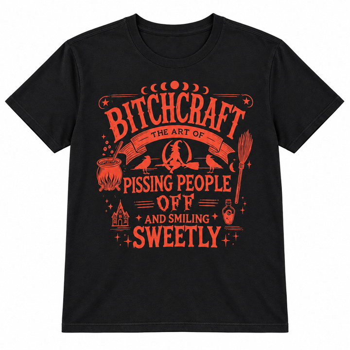 Bitchcraft orange-on-black Halloween graphic tee flat lay on white