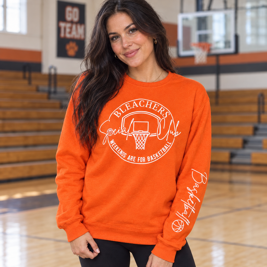 Bleacher Social Club orange basketball sweatshirt on model
