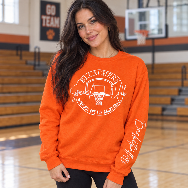 Bleacher Social Club orange basketball sweatshirt on model