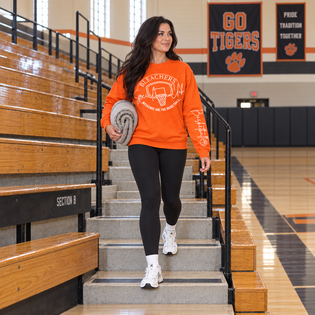 Bleacher Social Club orange sweatshirt full-body gym bleacher lifestyle