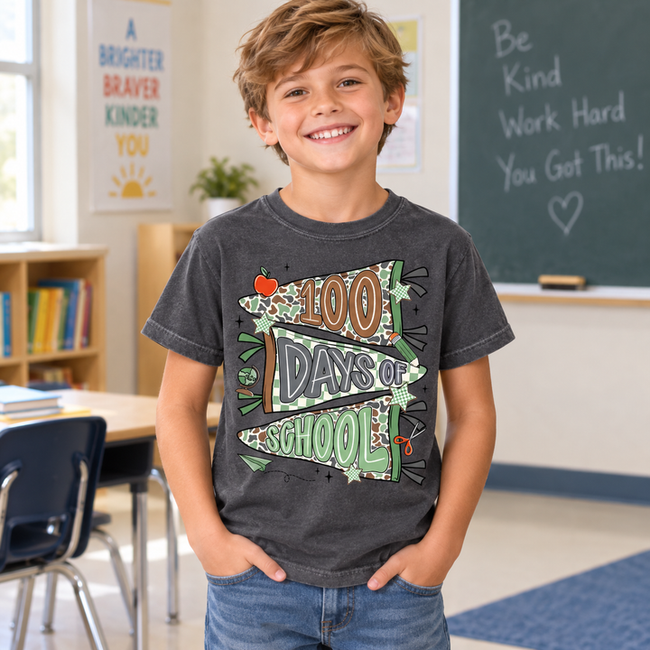 Boy wearing Camo 100 Days of School Pepper youth graphic T-shirt