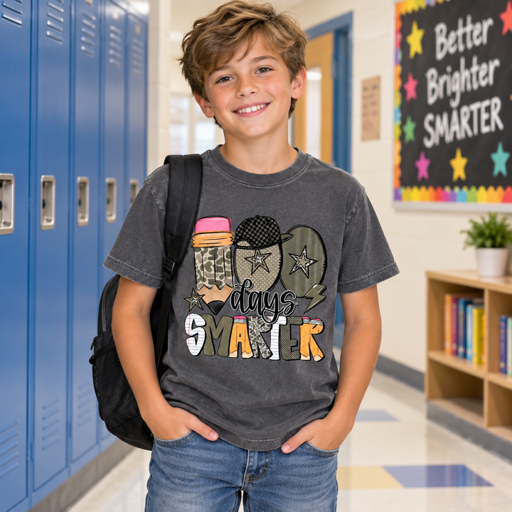 Boy wearing Camo 100 Days Smarter Pepper youth graphic T-shirt