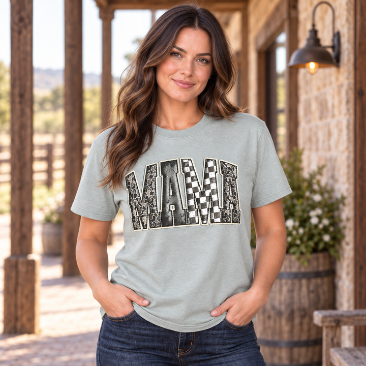Woman wearing the sage Camo Mama checkered graphic tee in a close-up ranch portrait