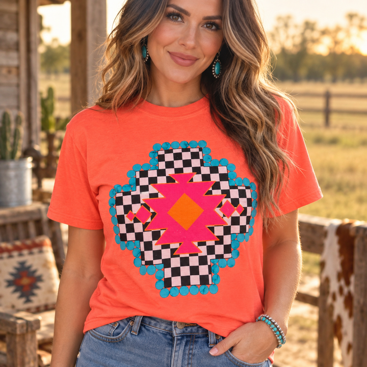 Checkered Aztec neon cantaloupe tee close model view on a ranch porch