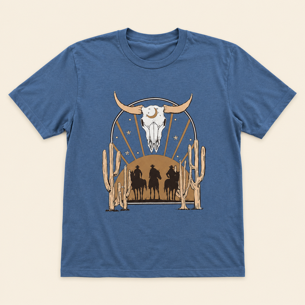 Indigo Cowboy Desert graphic tee with longhorn skull, riders, and cactus scene, flat product view