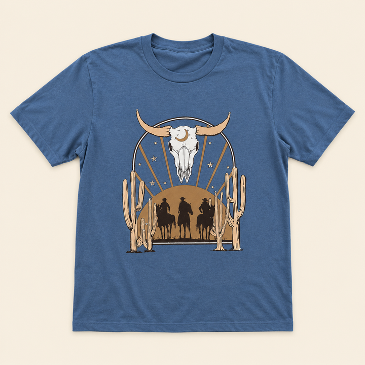Indigo Cowboy Desert graphic tee with longhorn skull, riders, and cactus scene, flat product view