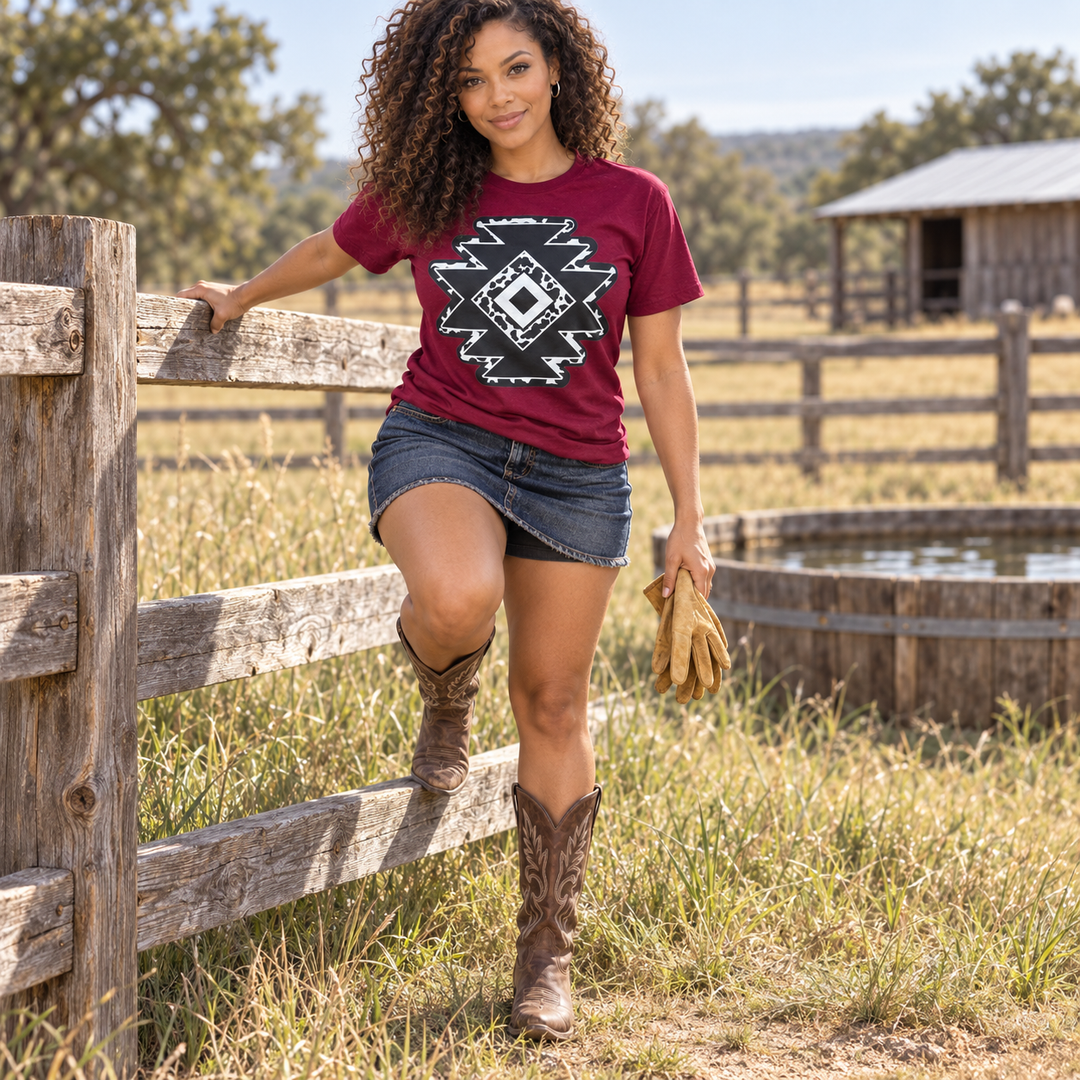 Cowprint Aztec Diamond burgundy tee full-body ranch fence lifestyle