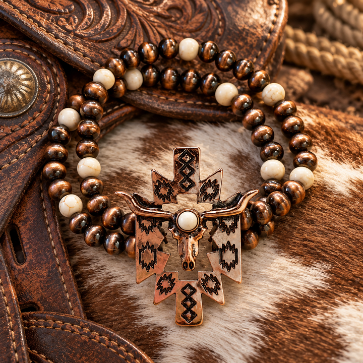 Desert Longhorn Aztec Bracelet styled with weathered leather and cowhide in a rustic Western setting