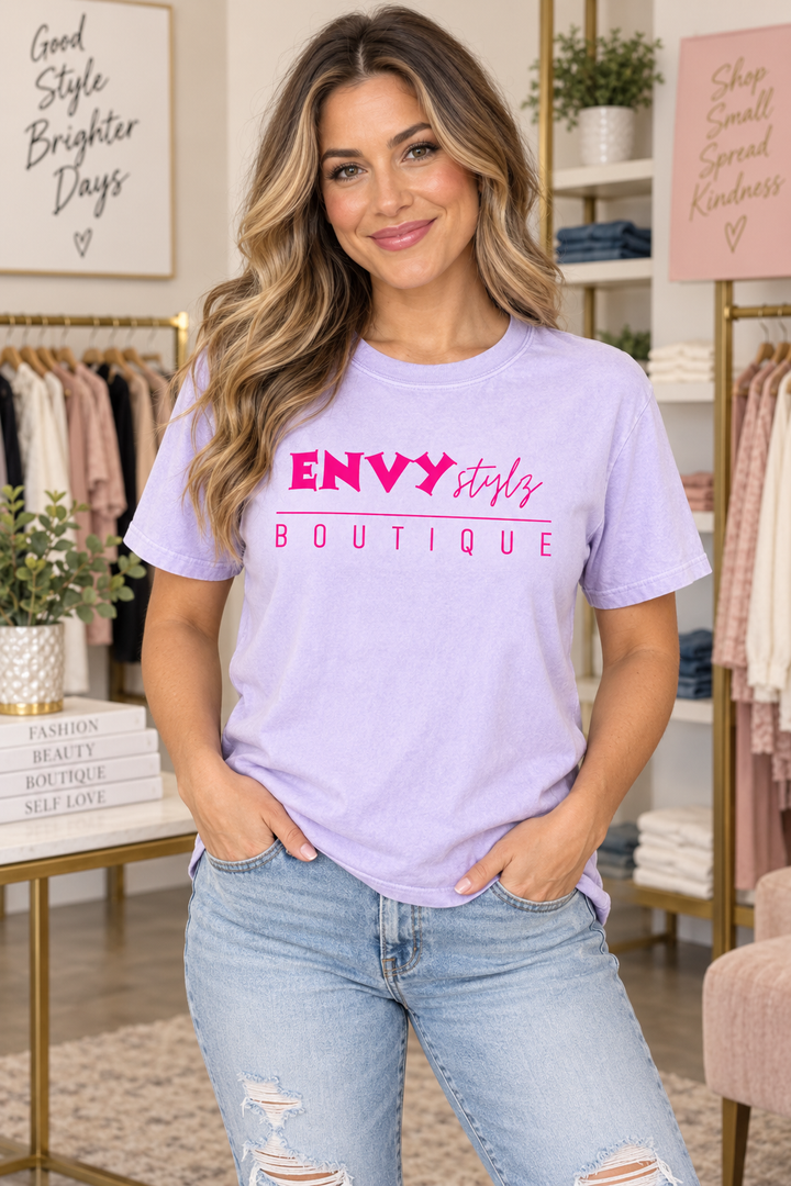 Woman wearing Envy Stylz Logo Lilac boutique graphic T-shirt