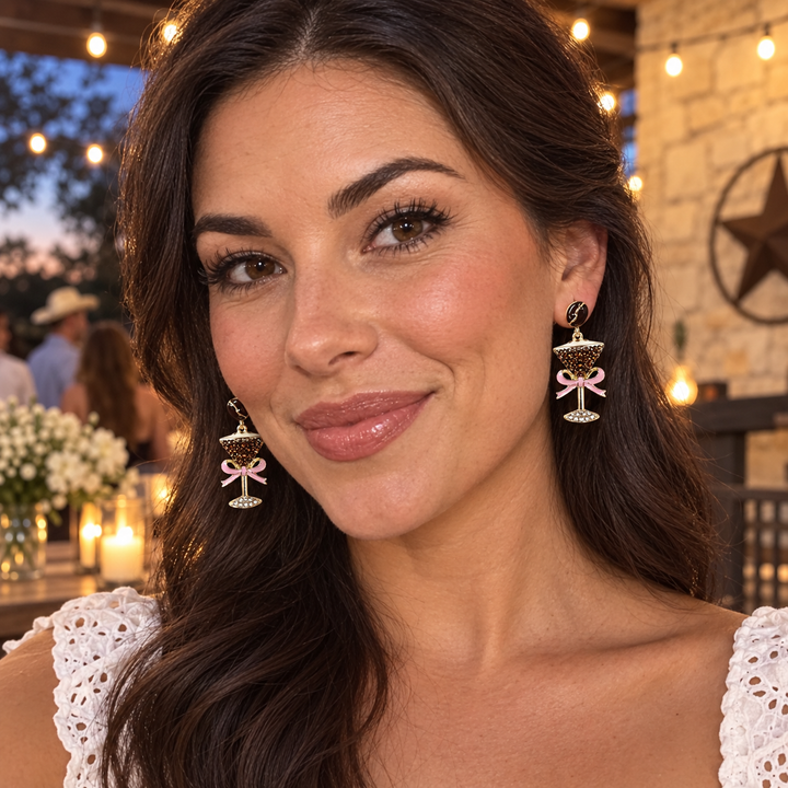 Woman wearing Espresso Martini dangle earrings at a Texas evening gathering