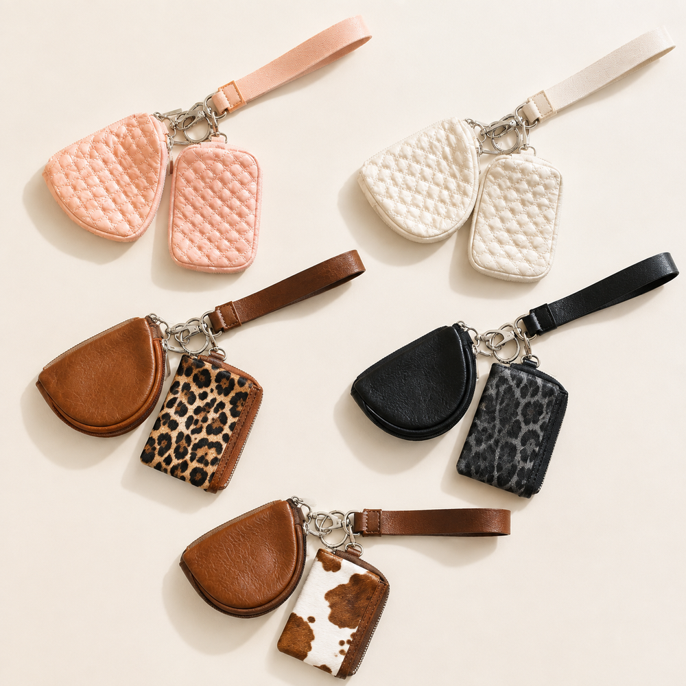 Everyday wristlet keychain wallet sets in light pink, ivory, brown leopard, black leopard, and brown cow print