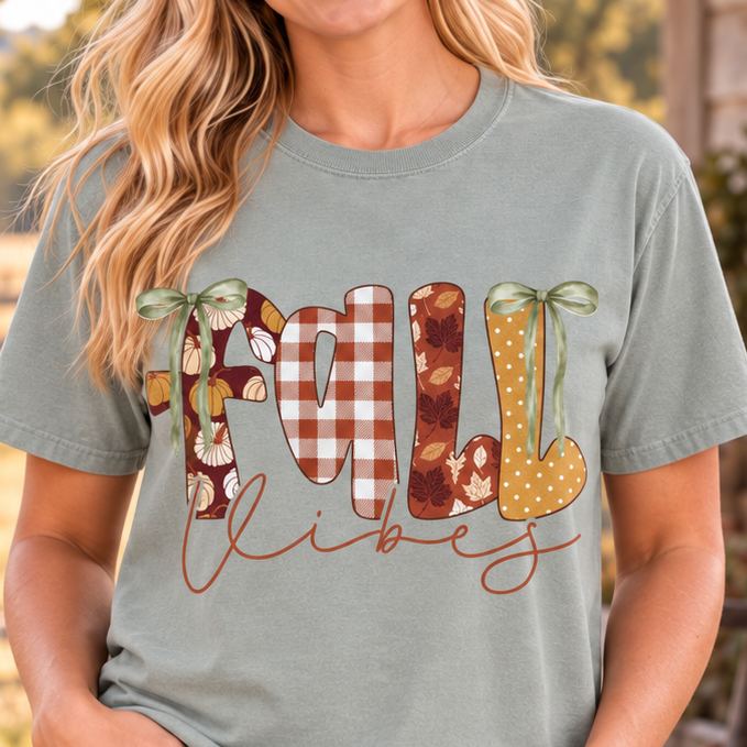 Fall Vibes Bay Comfort Colors graphic tee on model at a ranch porch
