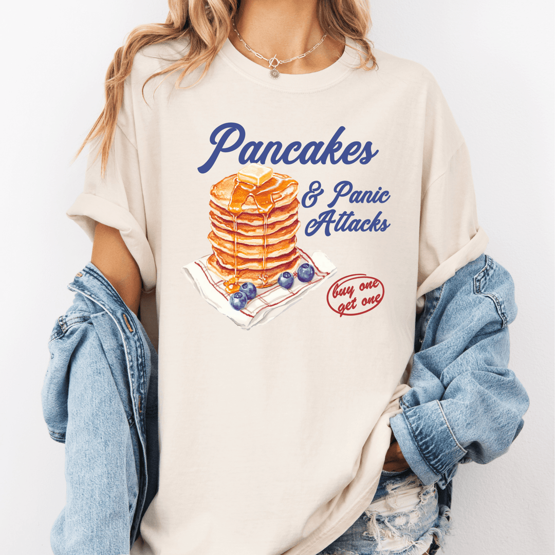 FestiviTees Apparel & Accessories > Clothing > Shirts & Tops Pancakes & Panic Attacks Graphic Tee