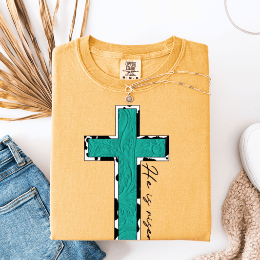 FestiviTees Women - Apparel - Shirts - T-Shirts Turquoise & Cow Print He is Risen Cross Graphic Tee