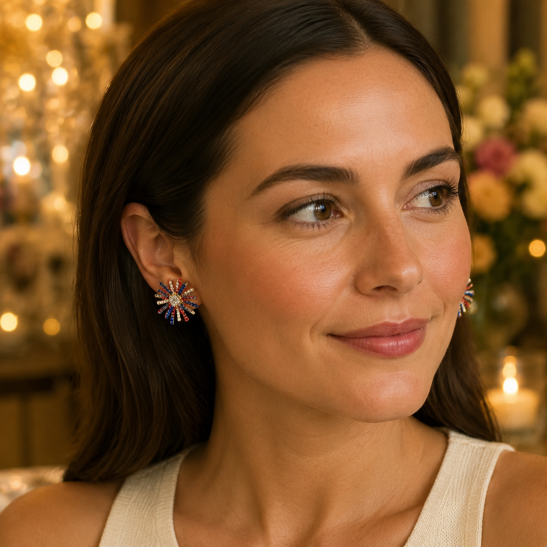 Woman wearing red white and blue rhinestone firework statement earrings