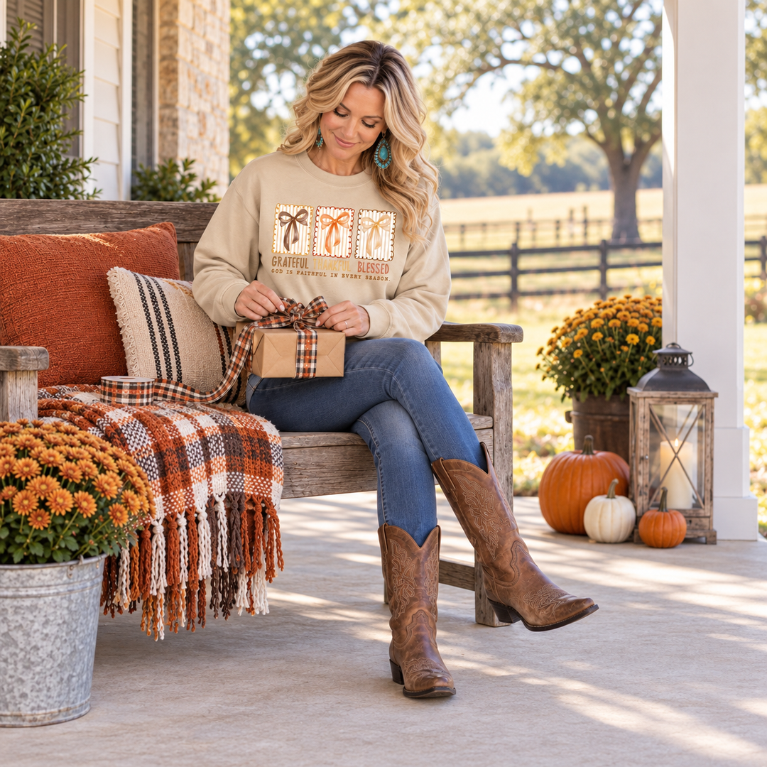 Grateful and Thankful Bows Tan Fall Crewneck seated full-body ranch porch lifestyle
