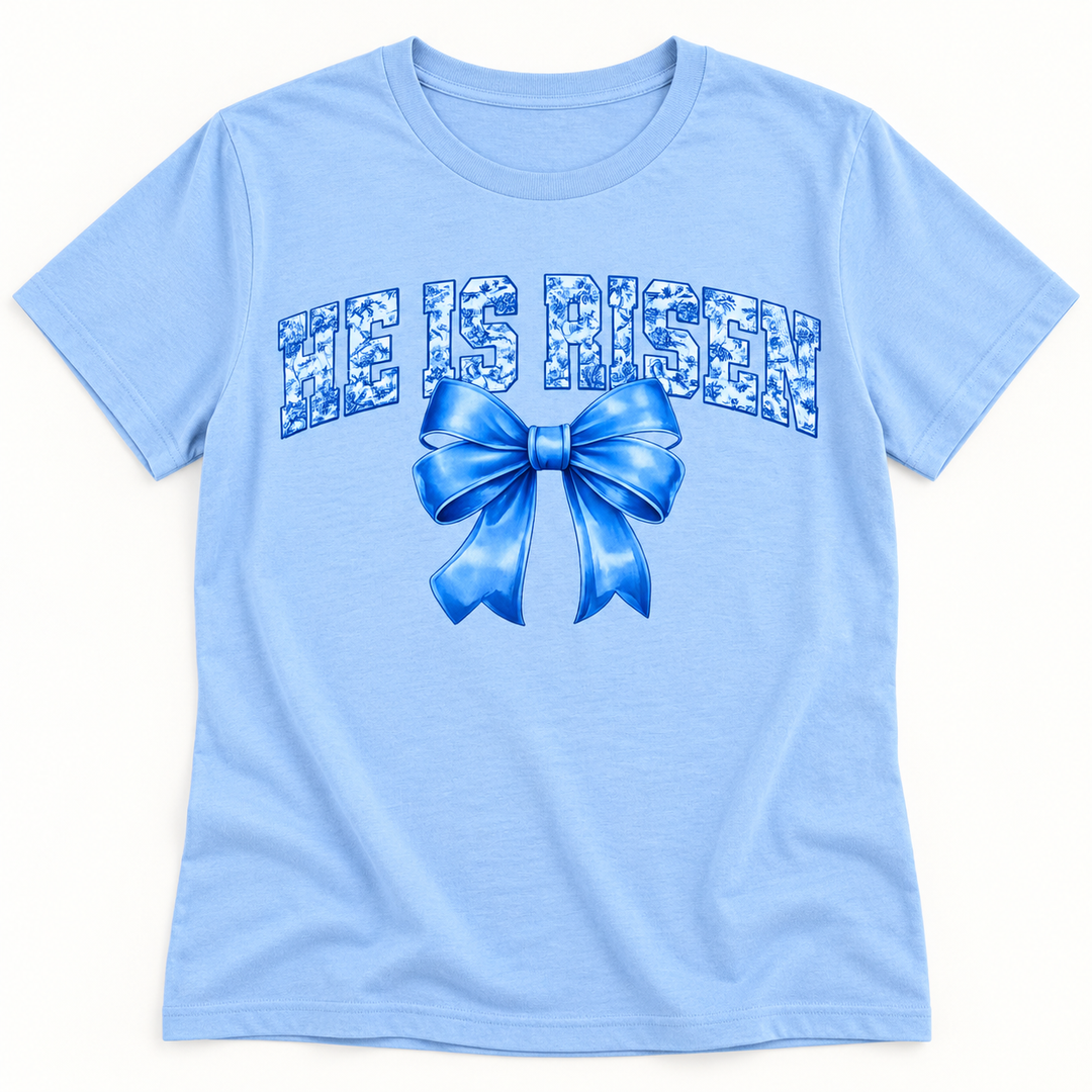 He Is Risen blue bow faith graphic tee flat product view