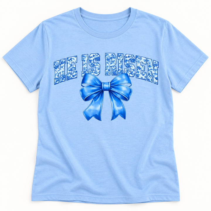 He Is Risen blue bow faith graphic tee flat product view