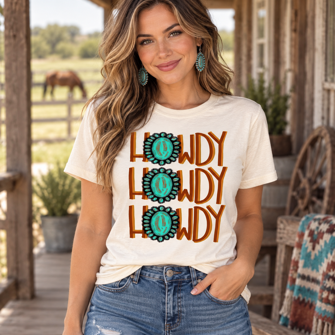Howdy Turquoise ivory Western tee close model view on a ranch porch