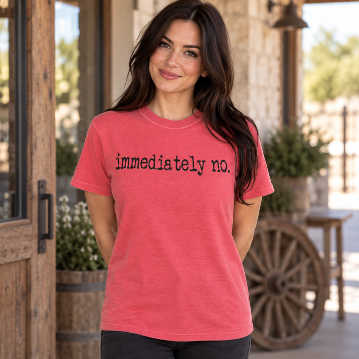 Woman wearing the watermelon pink Immediately No funny graphic tee in a close Western portrait