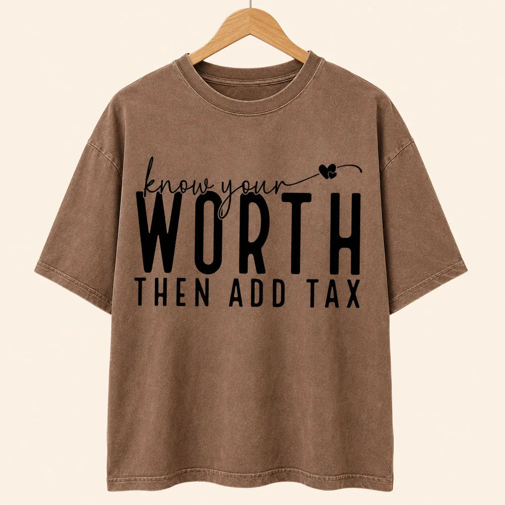 Clean studio view of Know Your Worth Then Add Tax empowering graphic tee