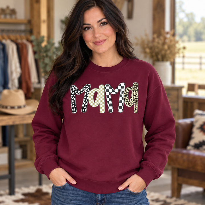 Woman wearing the maroon Mama boho leopard crewneck sweatshirt in a close Western portrait