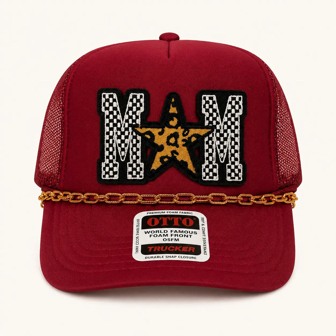 Burgundy MOM trucker hat with checkered letters, leopard star, and gold brim chain, product view