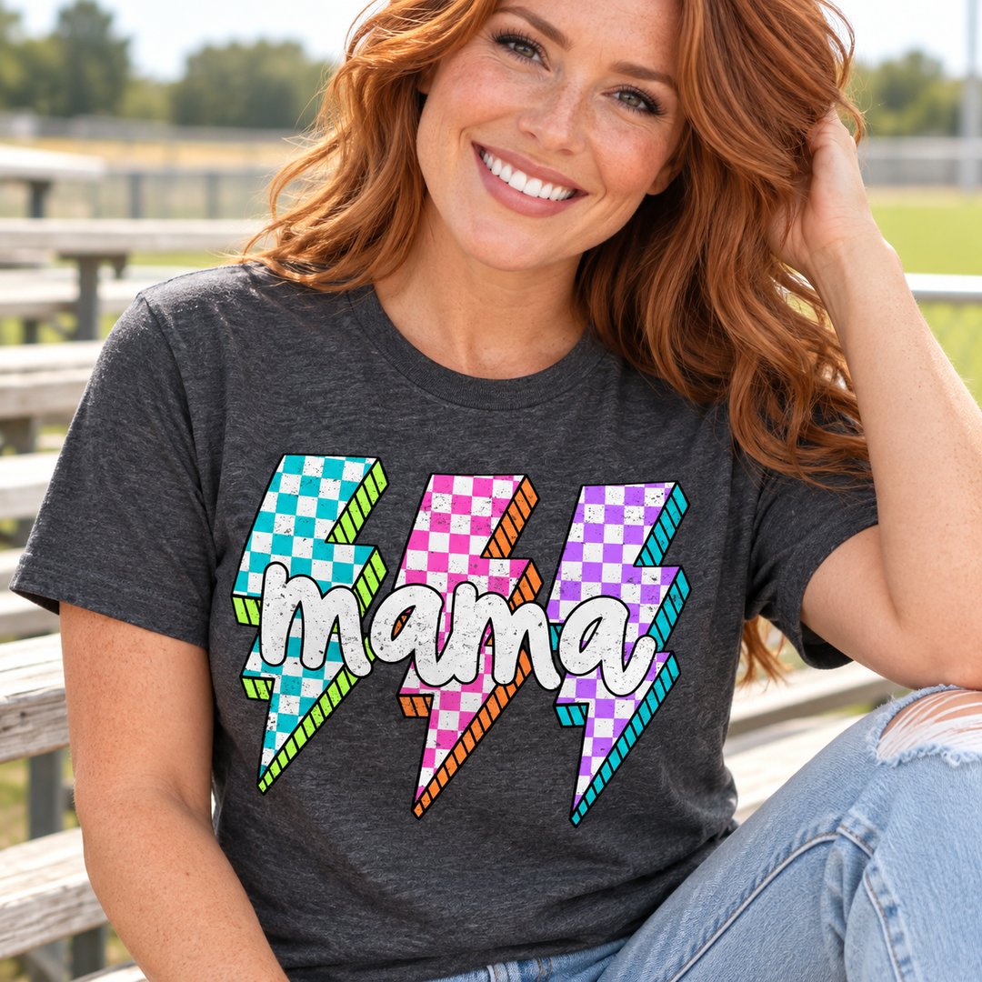 Neon Checkered Bolt Mama graphite tee close model view at a community field