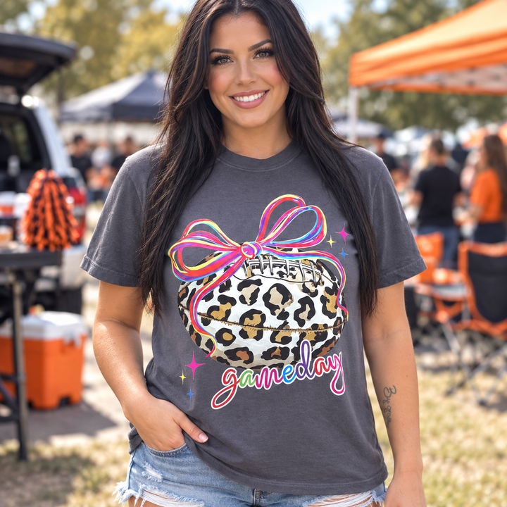 Neon Leopard Football Graphite Game Day tee modeled in a complete front view