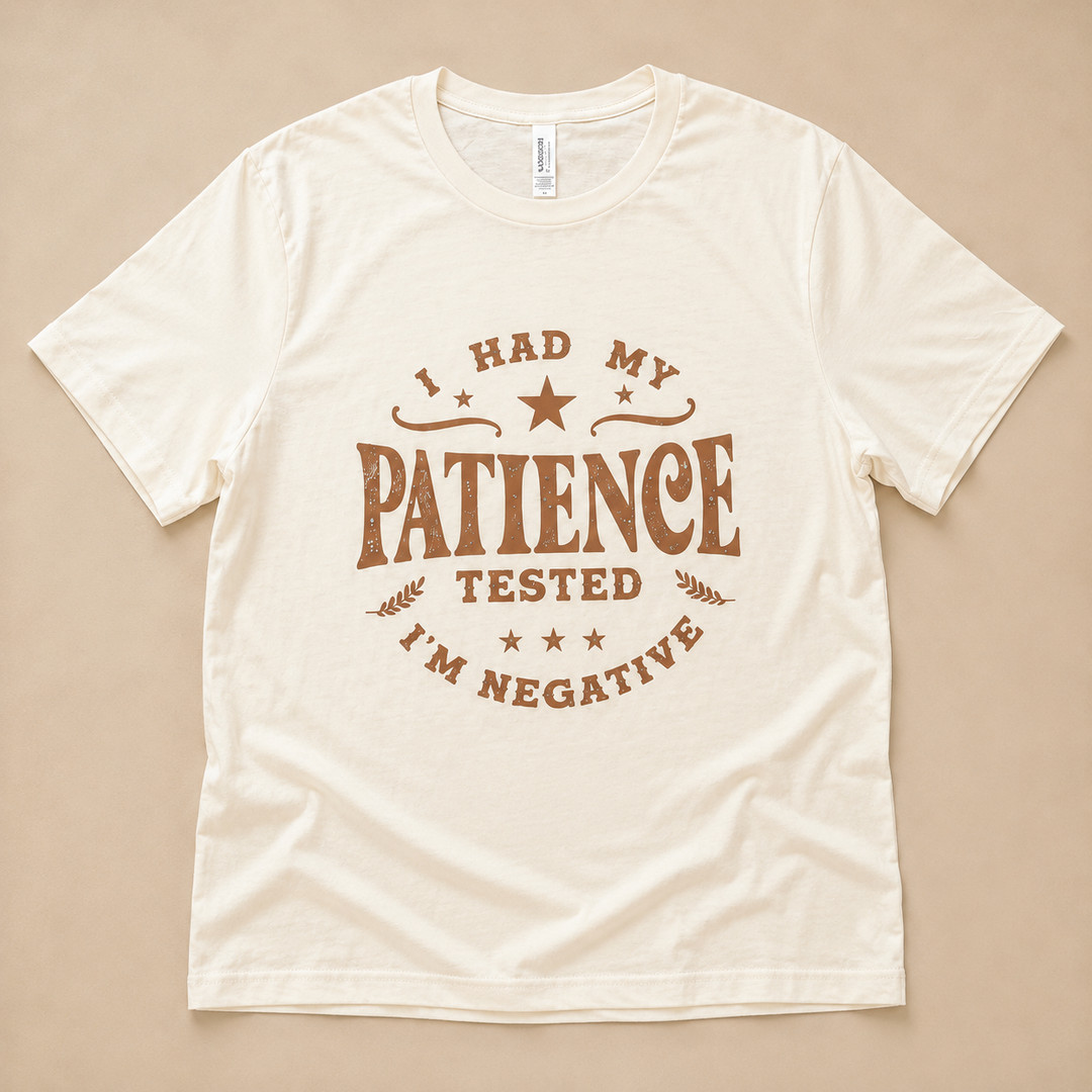 Ivory Patience Tested rhinestone graphic tee with tan Western lettering, flat product view