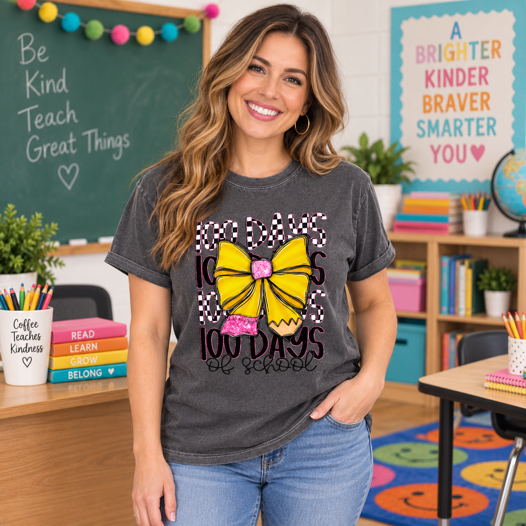 Teacher wearing Pencil Bow 100 Days of School Pepper graphic T-shirt