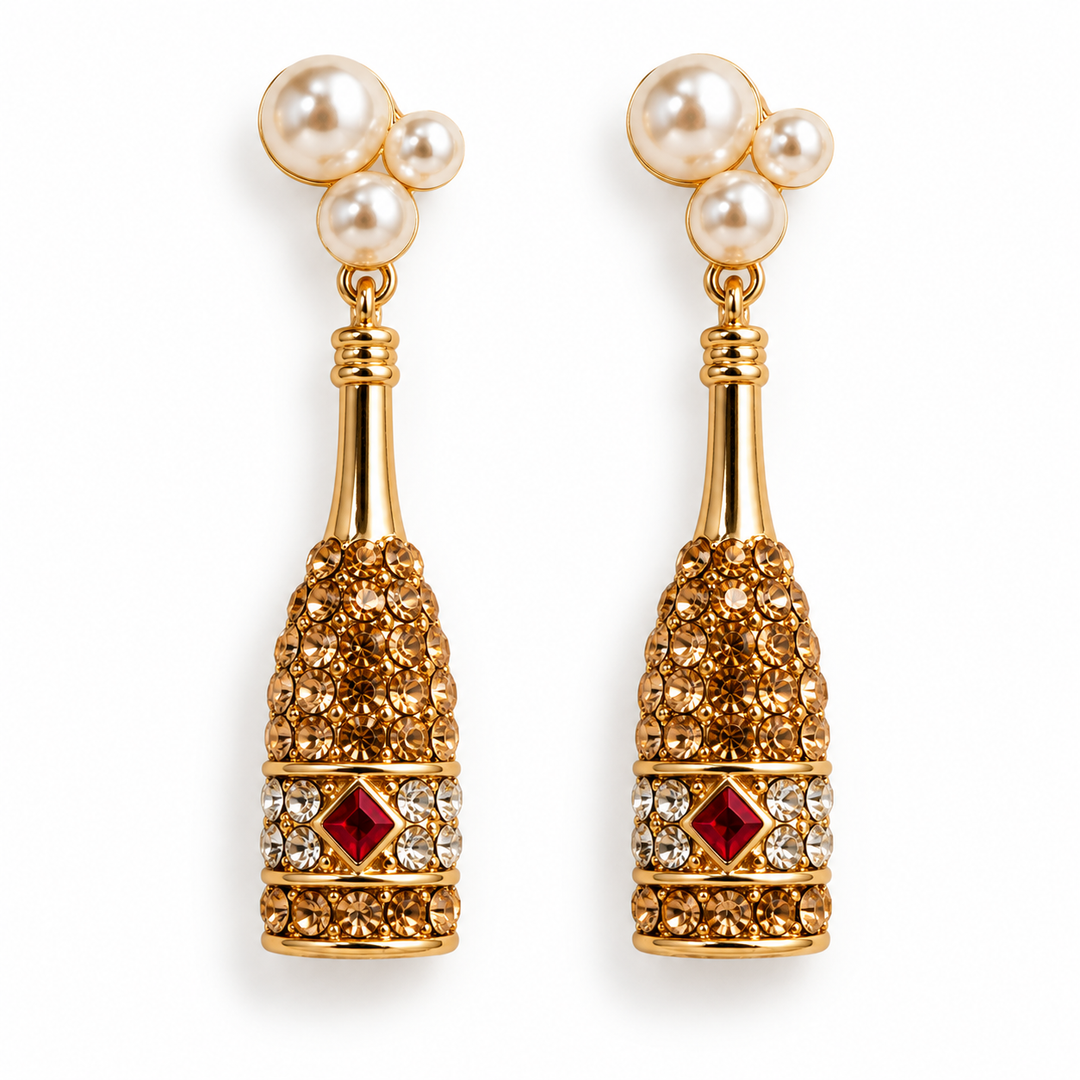 Pop the Bubbly champagne bottle earrings arranged on a clean white background