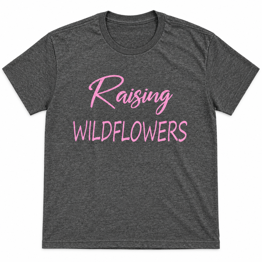 Charcoal Raising Wildflowers graphic tee with pink lettering on a white background