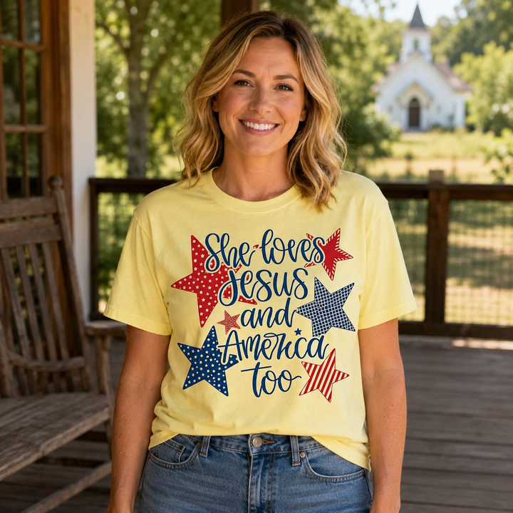 Woman wearing the She Loves Jesus and America Too butter yellow faith graphic tee on a ranch porch