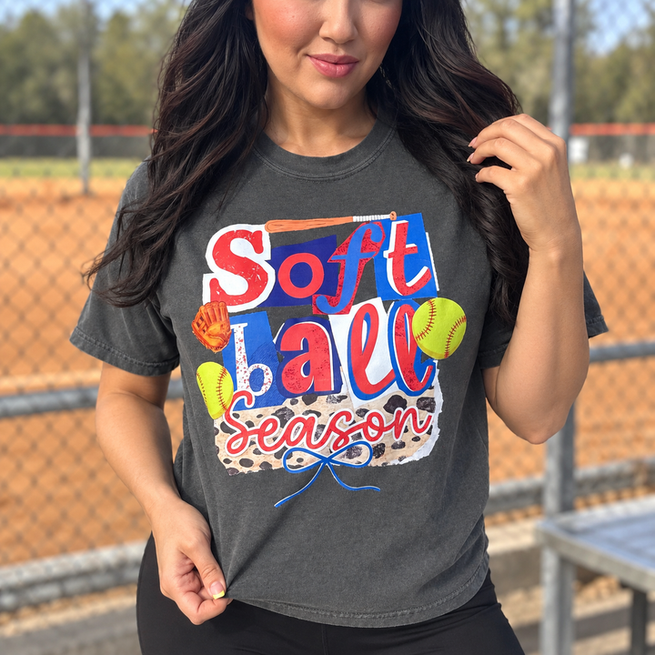 Softball Season patchwork Pepper tee close model view at a small-town softball field