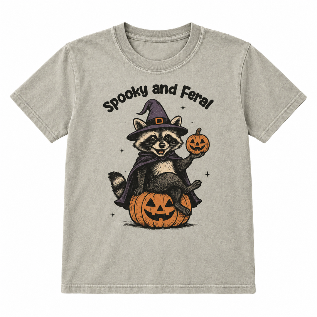 Spooky and Feral raccoon Halloween tee flat lay on white